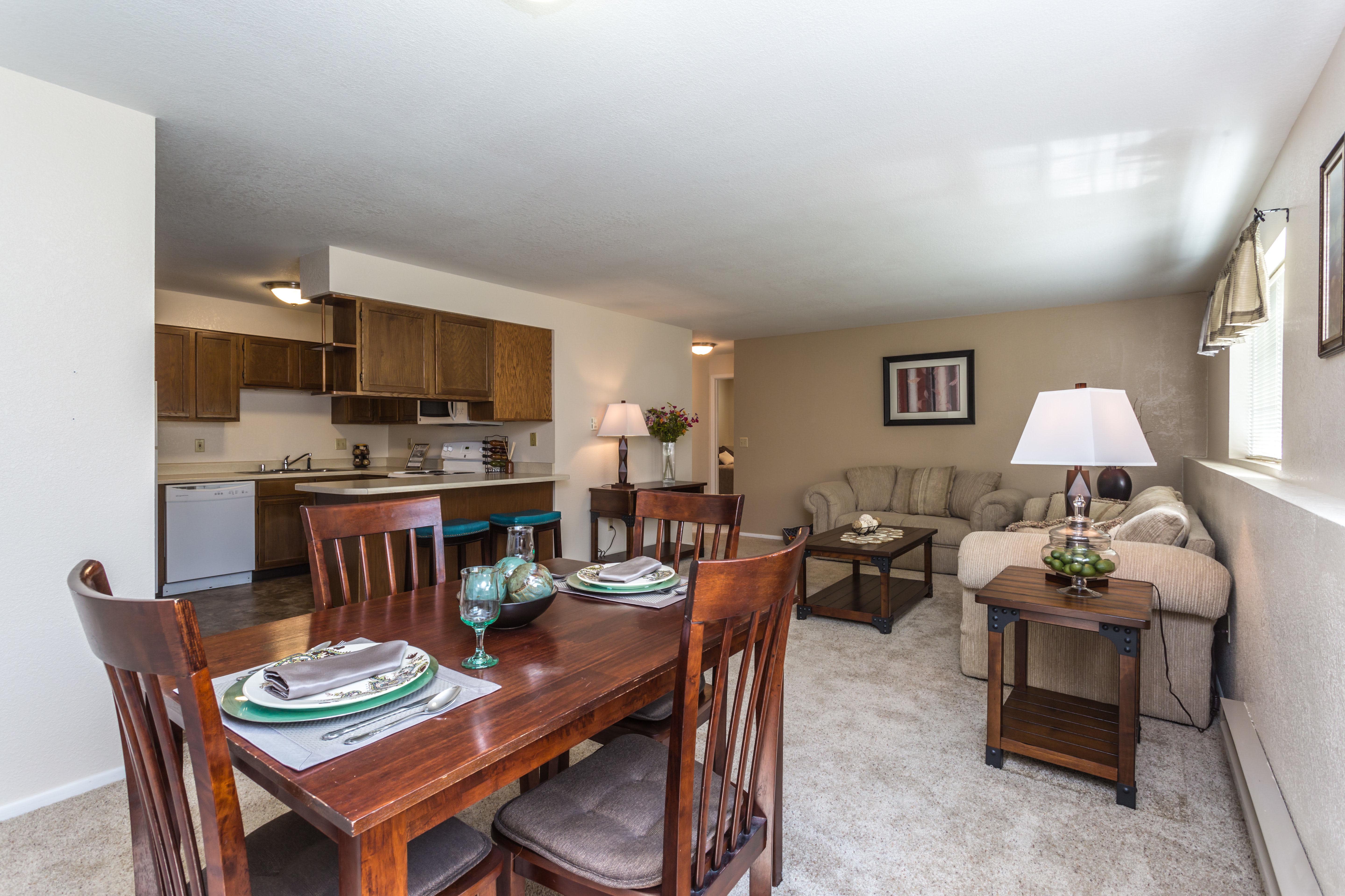 Olympic Village Apartments open floor plan dining and living area - Billings, MT